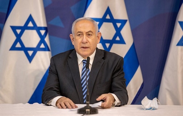 Israeli Prime Minister Benjamin Netanyahu issues a statement at the Israeli Defence Ministry in Tel Aviv on  July 27, 2020 following the high tensions with the Lebanese militant group Hezbollah at the Israeli-Lebanon border. (Photo by Tal SHAHAR / POOL / AFP)
